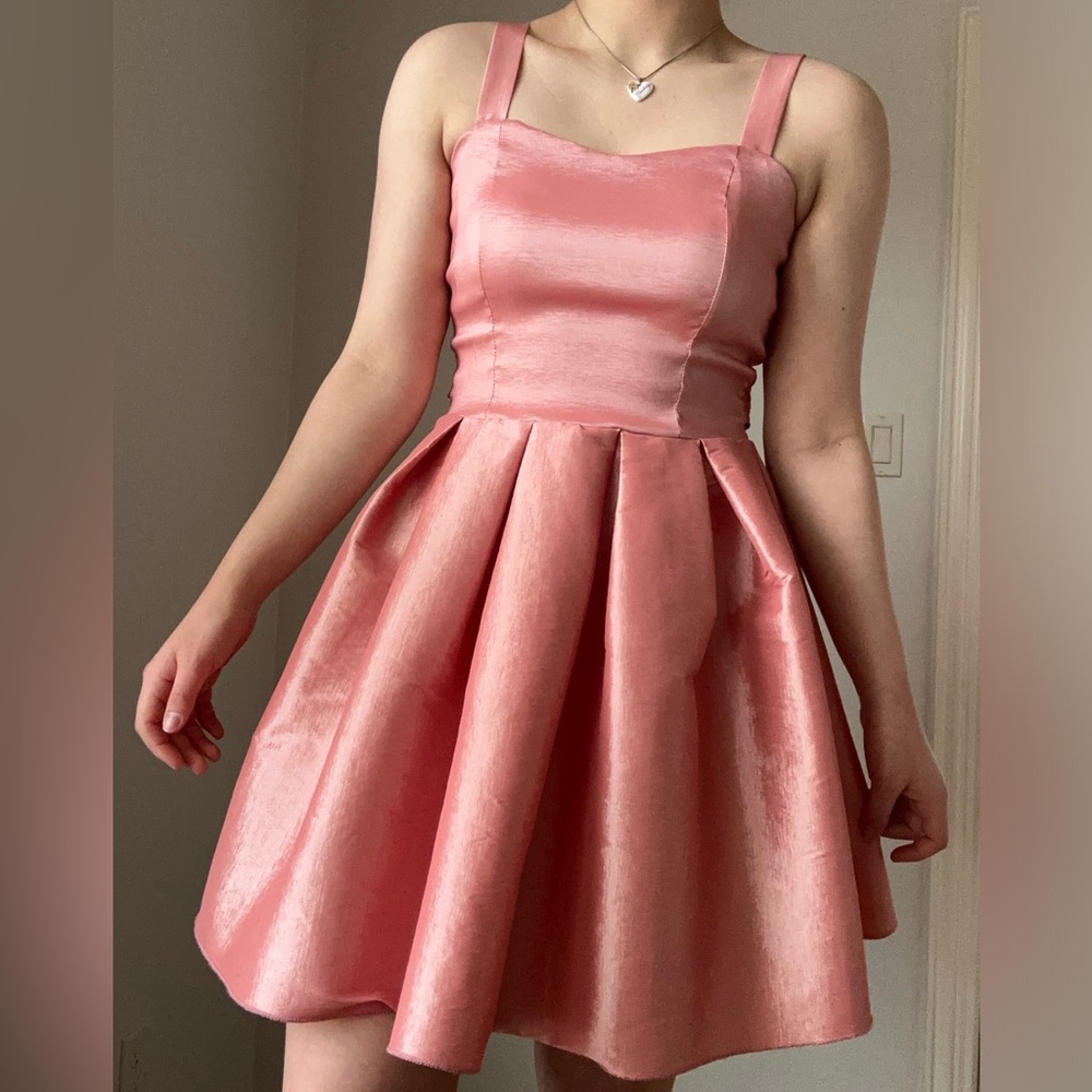 Pink satin A-line fit and flare dress with a bow tie back #glam #partydress